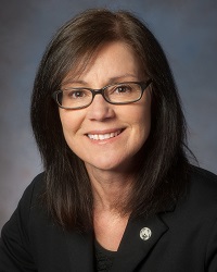 Lori St Onge, Commissioner