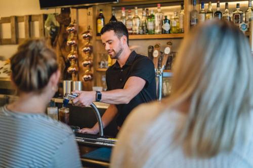 bartender with customers